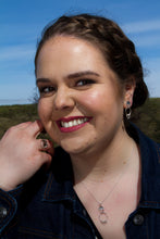 Load image into Gallery viewer, Round silver pendant with mini rings