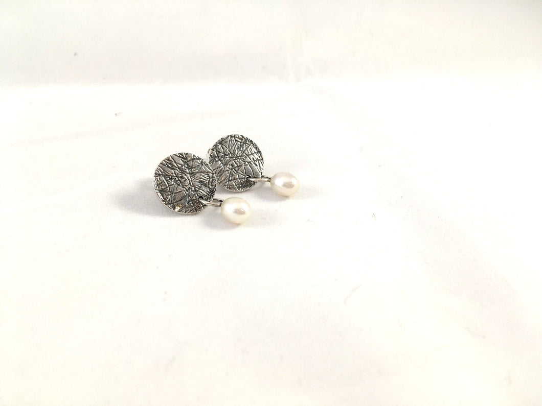 Boucles d'oreilles rondes avec perle en argent